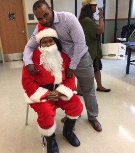 SCSF staff Rey LaChaux & Santa share a moment