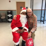 Teacher Tom Church and Santa make a great team